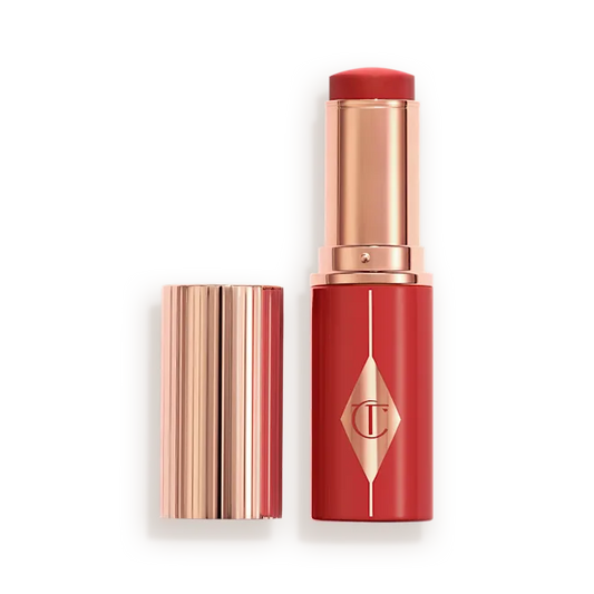 CHARLOTTE TILBURY UNREAL LIP + CHEEK GLOW BLUSH STICK WITH HYALURONIC ACID (CHERRY GLOW)