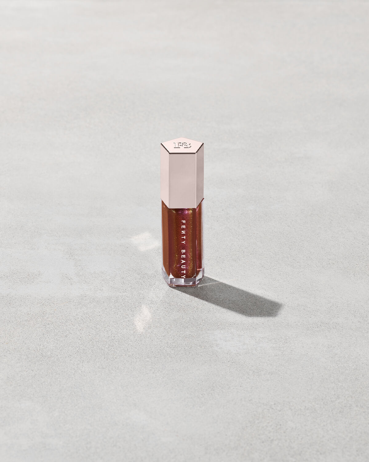 FENTY BEAUTY BY RIHANNA GLOSSBOMB UNIVERSAL LIP LUMINIZER (HOT CHOCOLIT FANTASY 09)