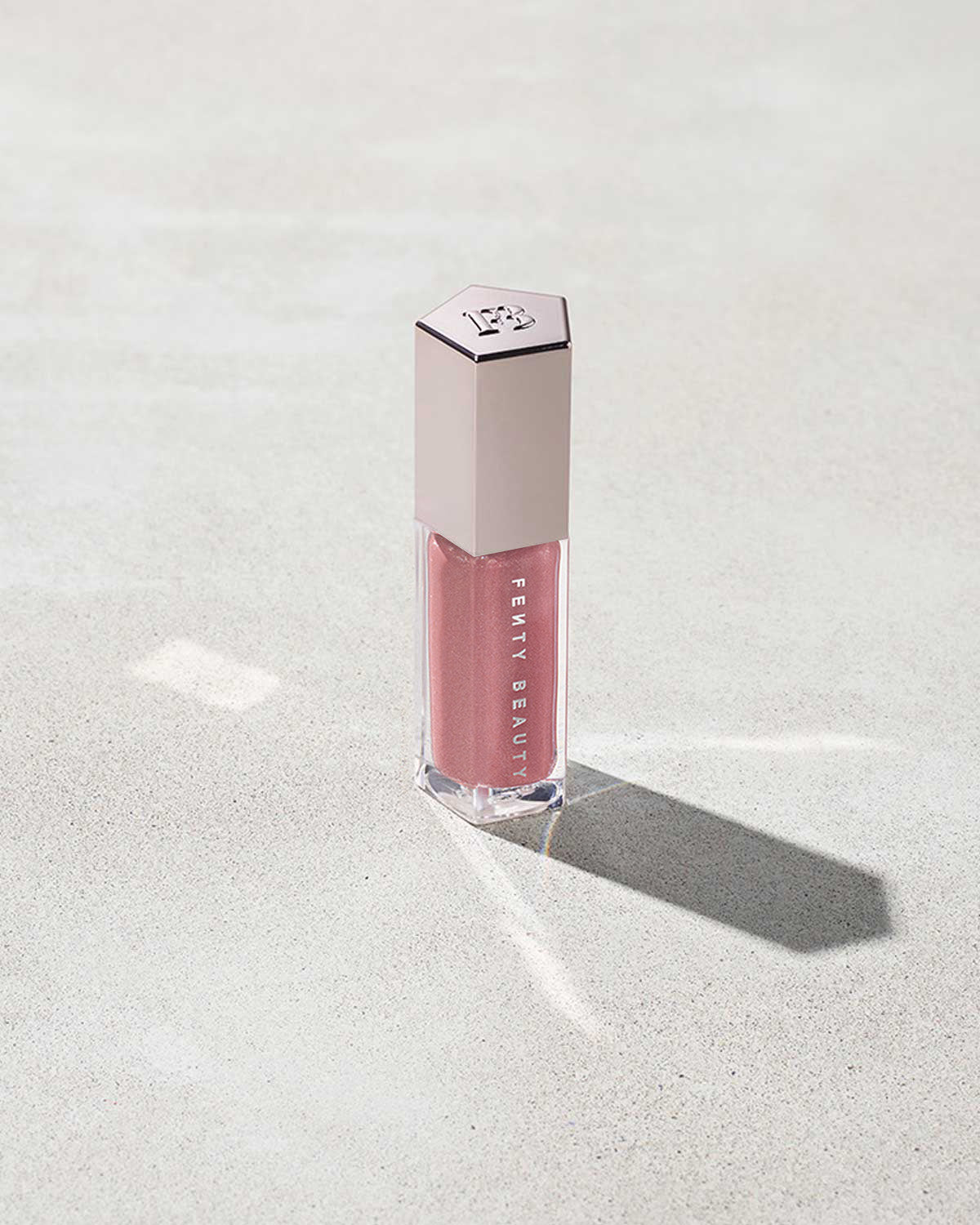FENTY BEAUTY BY RIHANNA GLOSSBOMB UNIVERSAL LIP LUMINIZER (FU$$Y 02)