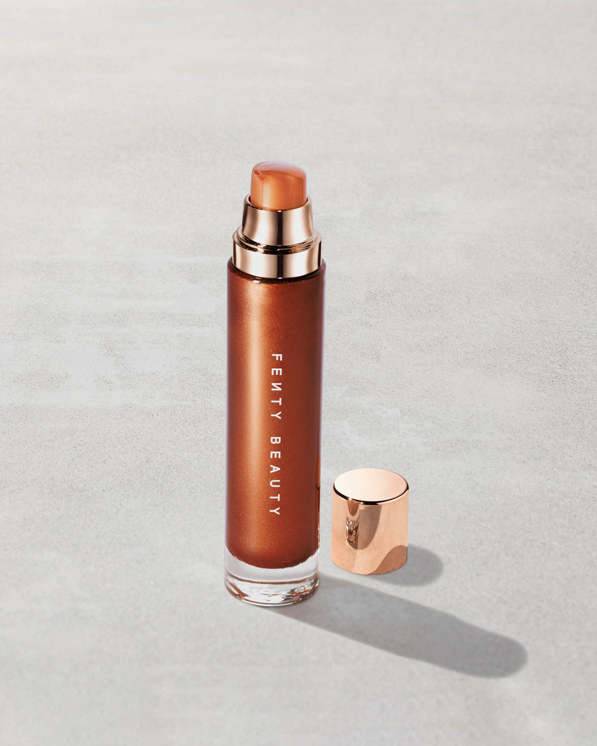 FENTY BEAUTY BODY LAVA BODY LUMINIZER (PENNY DROP)