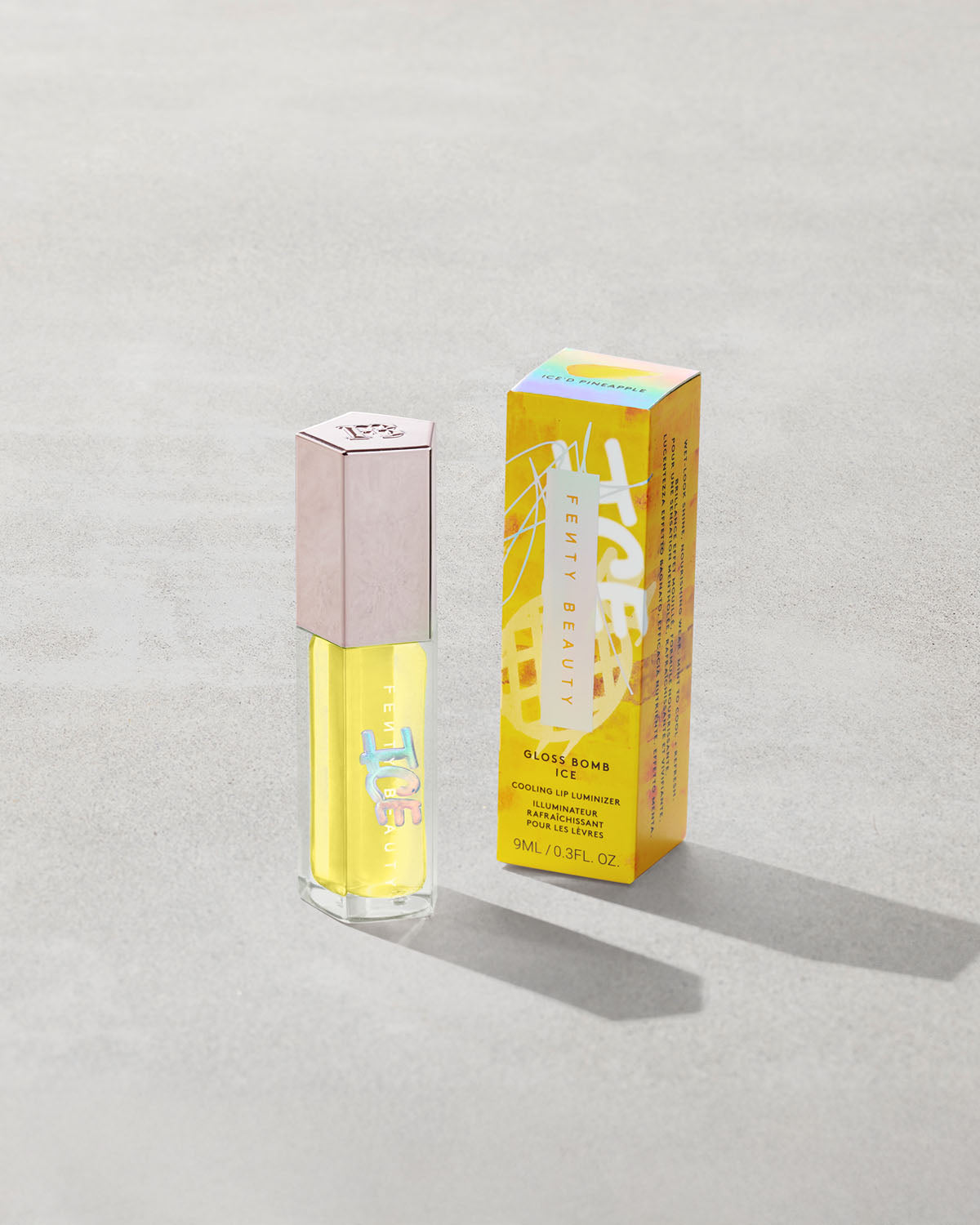FENTY GLOSS BOMB ICE COOLING LIP LUMINIZER (ICE'D PINEAPPLE)