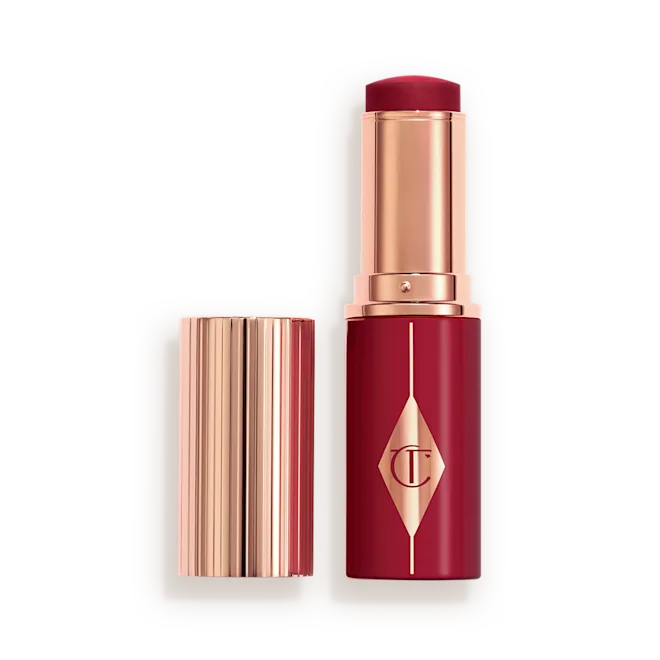 CHARLOTTE TILBURY  UNREAL LIP + CHEEK GLOW BLUSH STICK WITH HYALURONIC ACID (BERRY GLOW)
