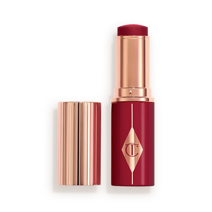 CHARLOTTE TILBURY  UNREAL LIP + CHEEK GLOW BLUSH STICK WITH HYALURONIC ACID (BERRY GLOW)
