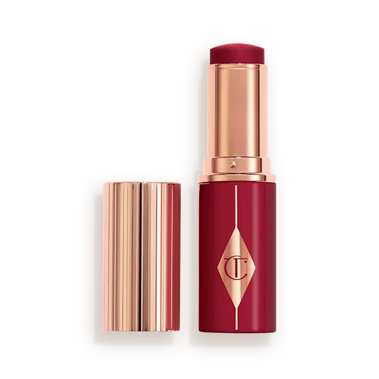 CHARLOTTE TILBURY  UNREAL LIP + CHEEK GLOW BLUSH STICK WITH HYALURONIC ACID (BERRY GLOW)