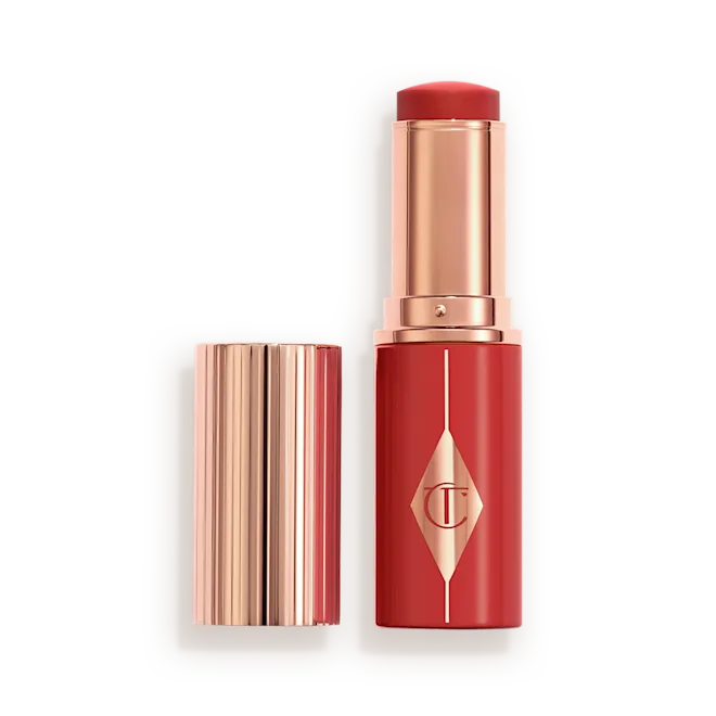 CHARLOTTE TILBURY  UNREAL LIP + CHEEK GLOW BLUSH STICK WITH HYALURONIC ACID (CHERRY GLOW)
