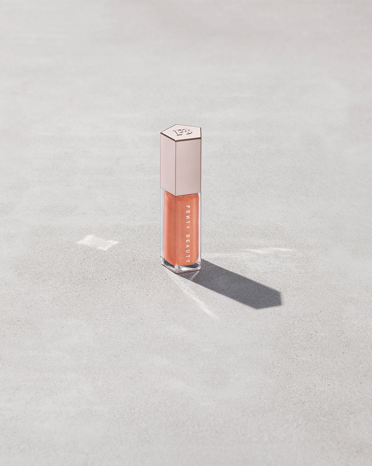 FENTY BEAUTY BY RIHANNA GLOSSBOMB UNIVERSAL LIP LUMINIZER (HOT COCOLIT ) (Copy)