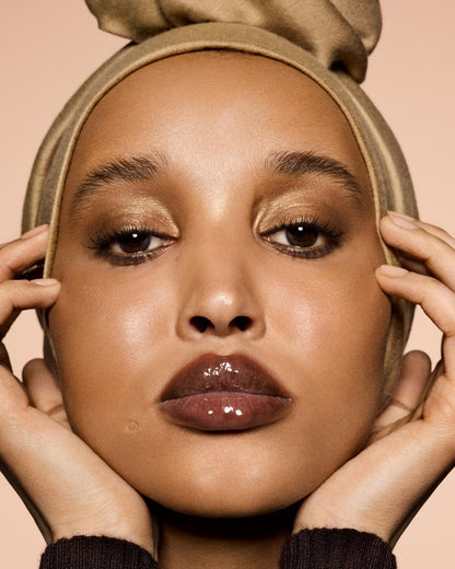 FENTY BEAUTY BY RIHANNA  GLOSS BOMB HEAT UNIVERSAL LIP LUMINIZER + PLUMPER  (hot chocolit heat 04)