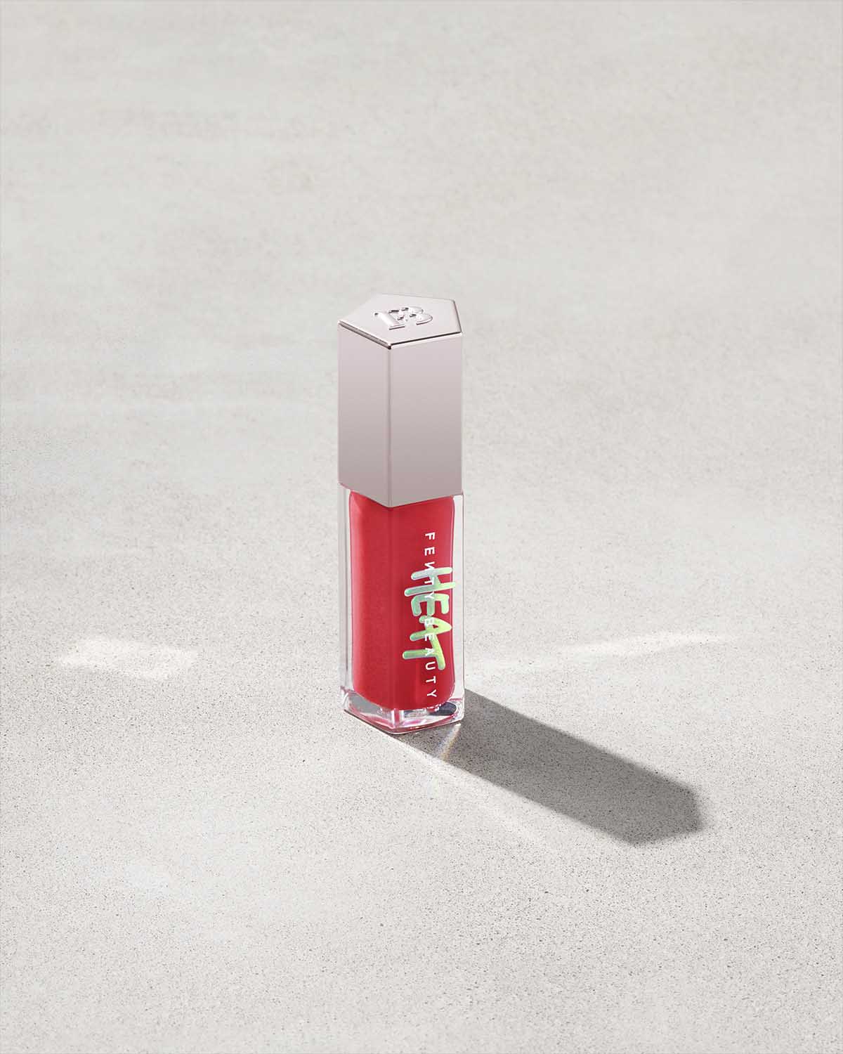 FENTY BEAUTY BY RIHANNA  GLOSS BOMB HEAT UNIVERSAL LIP LUMINIZER + PLUMPER  (hot cherry)