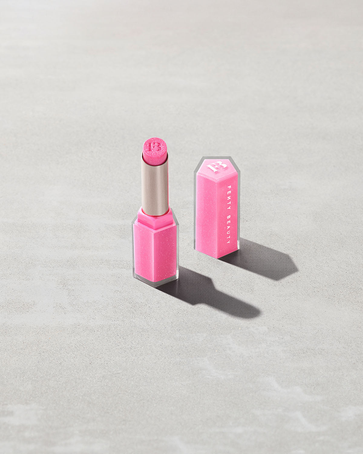 FENTY BEAUTY GLOSS BOMB STIX HIGH SHINE GLOSS STICK (FLAMINGO FLING)
