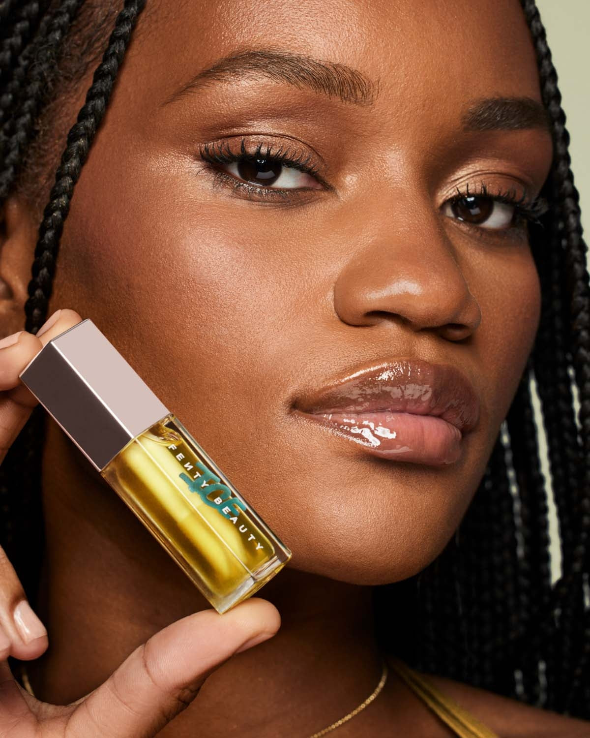 FENTY GLOSS BOMB ICE COOLING LIP LUMINIZER (ICE'D PINEAPPLE)