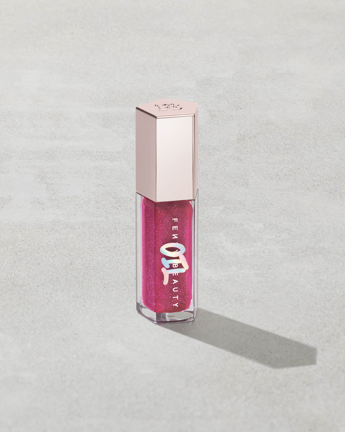 FENTY BEAUTY GLOSS BOMB OIL LUMINISING LIP OIL N GLOSS (RAZZBERRY JAMZ)