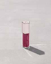 FENTY BEAUTY BY RIHANNA GLOSSBOMB UNIVERSAL LIP LUMINIZER (FUSHIA FLEX)