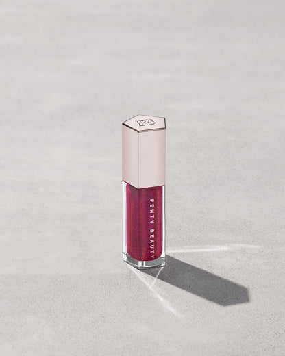 FENTY BEAUTY BY RIHANNA GLOSSBOMB UNIVERSAL LIP LUMINIZER (FUSHIA FLEX)