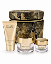 ESTEE LAUDER THE GOLD KIT WITH A BEAUTIFUL GOLD  BLACK ROUND BAG AND 3 MINI ITEMS