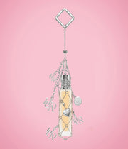 HUDA BEAUTY TRAVEL SPRAY FRAGRANCE HOLDER WITH CHARMS