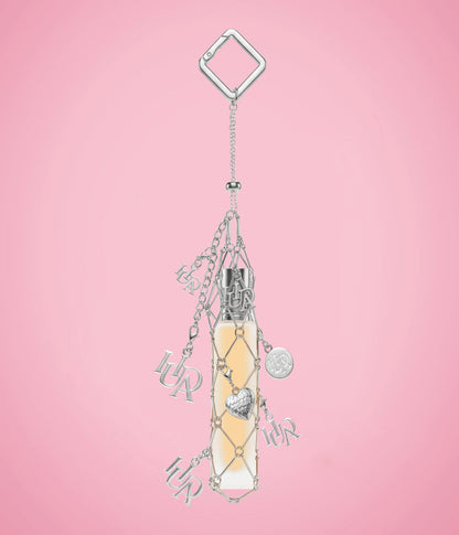 HUDA BEAUTY TRAVEL SPRAY FRAGRANCE HOLDER WITH CHARMS