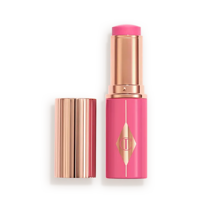CHARLOTTE TILBURY  UNREAL LIP + CHEEK GLOW BLUSH STICK WITH HYALURONIC ACID (PINK GLOW)