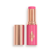 CHARLOTTE TILBURY  UNREAL LIP + CHEEK GLOW BLUSH STICK WITH HYALURONIC ACID (PINK GLOW)