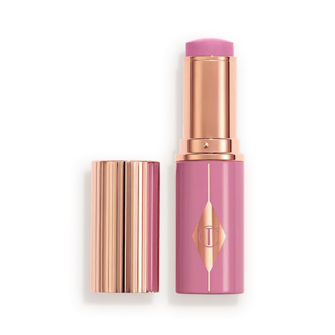 CHARLOTTE TILBURY  UNREAL LIP + CHEEK GLOW BLUSH STICK WITH HYALURONIC ACID (PRETTY GLOW)