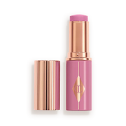 CHARLOTTE TILBURY  UNREAL LIP + CHEEK GLOW BLUSH STICK WITH HYALURONIC ACID (PRETTY GLOW)