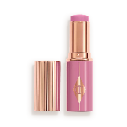 CHARLOTTE TILBURY  UNREAL LIP + CHEEK GLOW BLUSH STICK WITH HYALURONIC ACID (PRETTY GLOW)