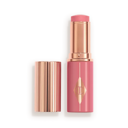 CHARLOTTE TILBURY  UNREAL LIP + CHEEK GLOW BLUSH STICK WITH HYALURONIC ACID (ROSY GLOW)